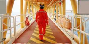 worker walking in red